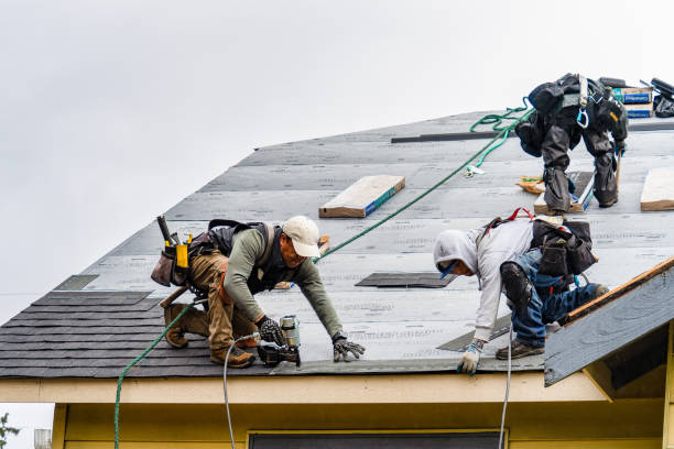 Professional Gutter Installation technician working in Windfall, IN
